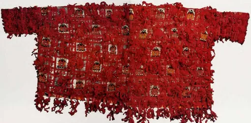 Chimú Culture Tasseled Red Tunic (1200-1400 A.D.), 58 x 162 cm, Chancay Valley (Amano Museum, Lima)