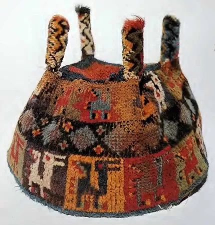 Huari (Wari) Culture Four-pointed Pile Hat (800-1000 A.D.), 16 16 x 16 cm, Palpa, Nazca Valley (Amano Museum, Lima) Huari (Wari) Culture Four-pointed Pile Hat (800-1000 A.D.), 16 16 x 16 cm, Palpa, Nazca Valley (Amano Museum, Lima)