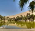 Huacachina, a picture-postcard oasis on the northern border of the Atacama Desert in Ica, Peru