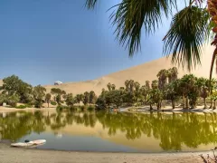 Huacachina, a picture-postcard oasis on the northern border of the Atacama Desert in Ica, Peru