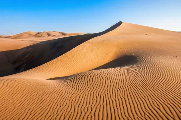 Huacachina is surrounded by some of the most impressive and beautiful dunes in South America. Huacachina is surrounded by some of the most impressive and beautiful dunes in South America.