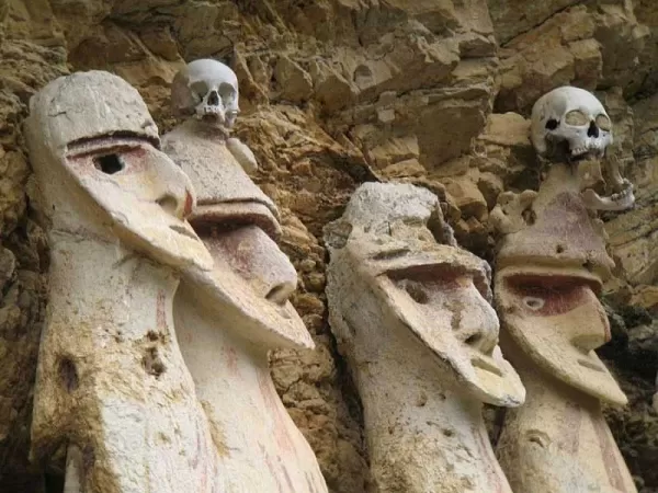 The tombs consist of a limbless torso with a characteristic head on top The tombs consist of a limbless torso with a characteristic head on top