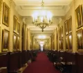 Hall filled with pictures inside the Justice Palace in Lima, Peru