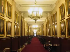 Hall filled with pictures inside the Justice Palace in Lima, Peru