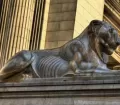 Appealing lion statue outisde of the Justice Palace in Lima, Peru