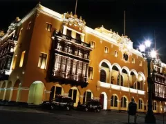 Exterior of the Municipal Palace at night in Lima, Peru