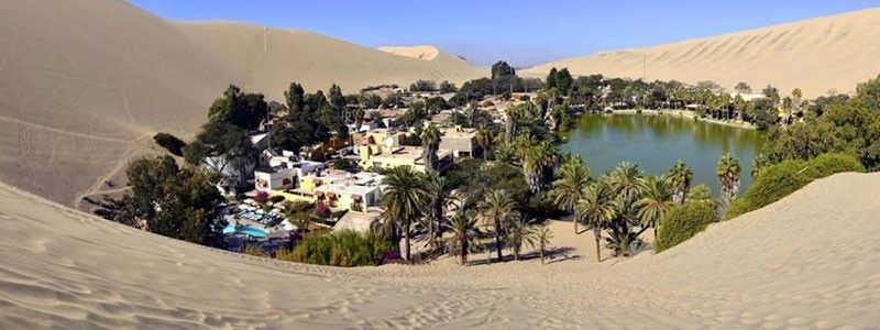 Huacachina, a picture-postcard oasis on the northern border of the Atacama Desert in Ica, Peru